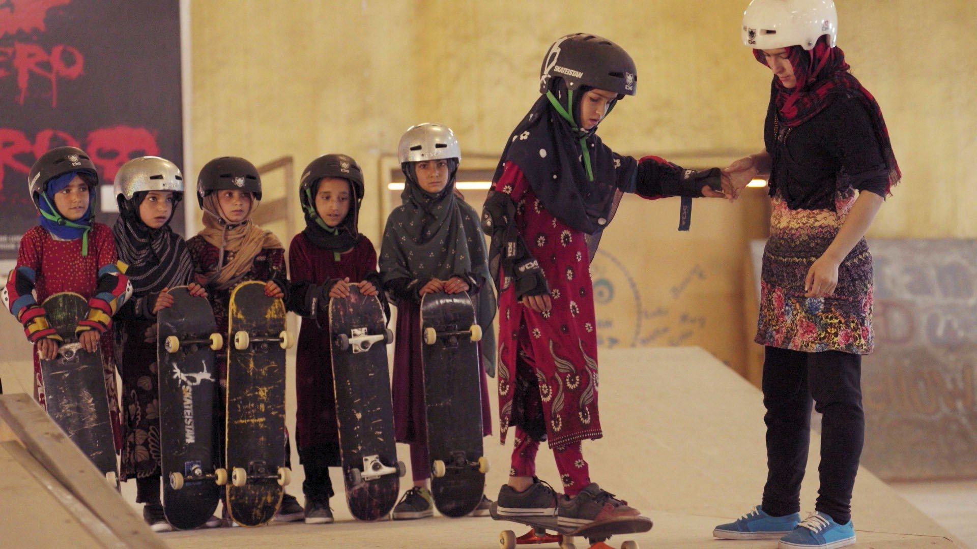 Learning to Skateboard in a Warzone (If You're a Girl) Background