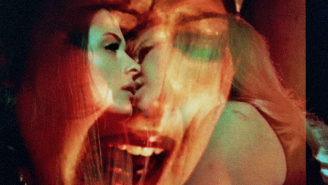 Blood Orgy of the She-Devils Background