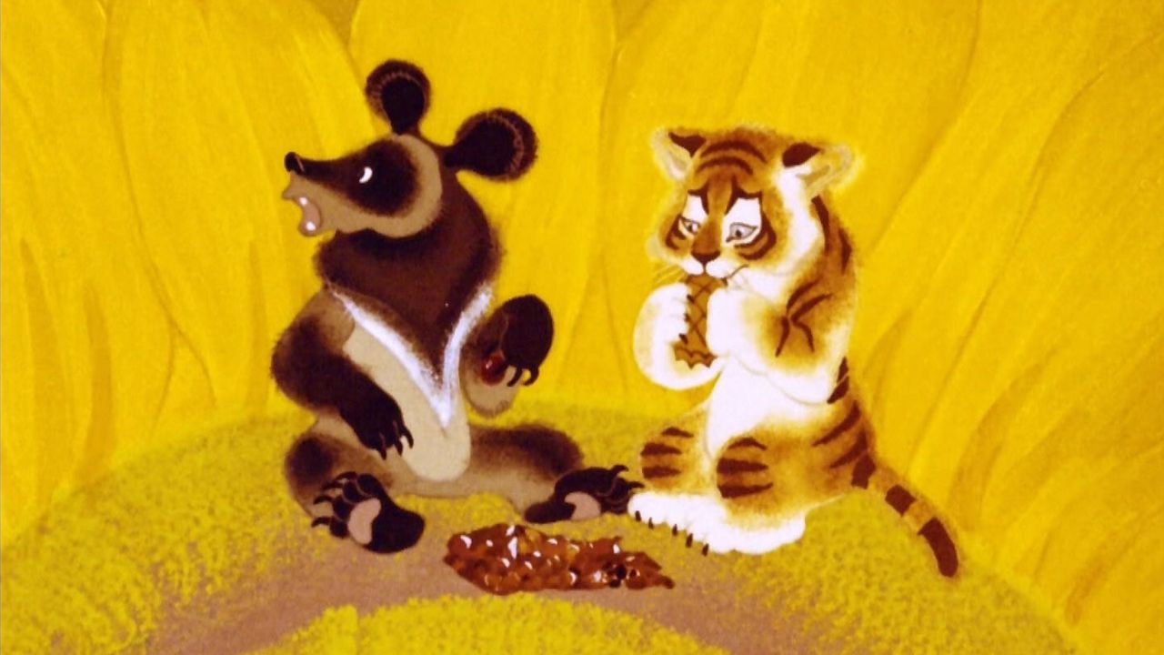 The Little Tiger on the Sunflower Background