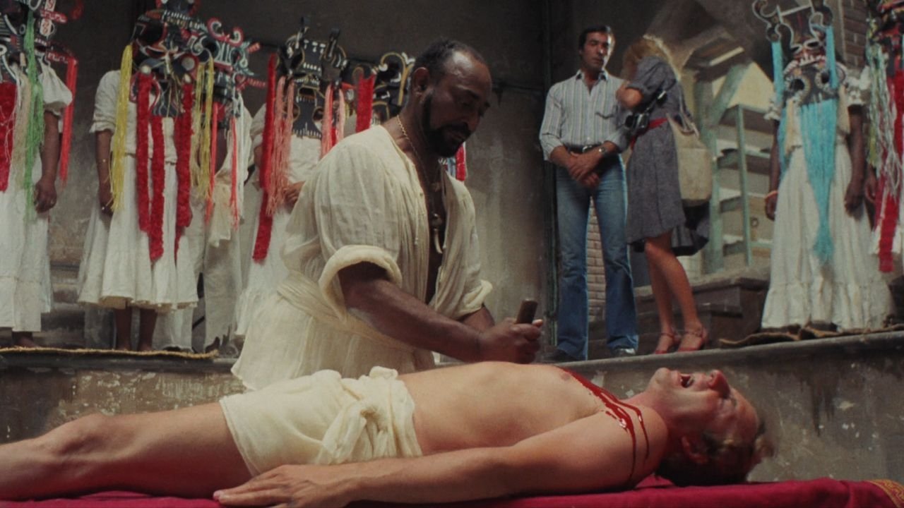 Papaya: Love Goddess of the Cannibals Background