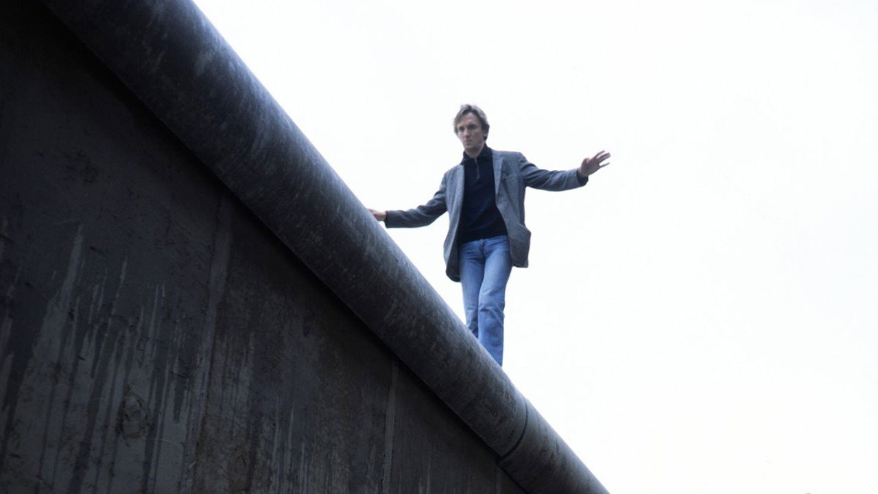 The Man on the Wall Background