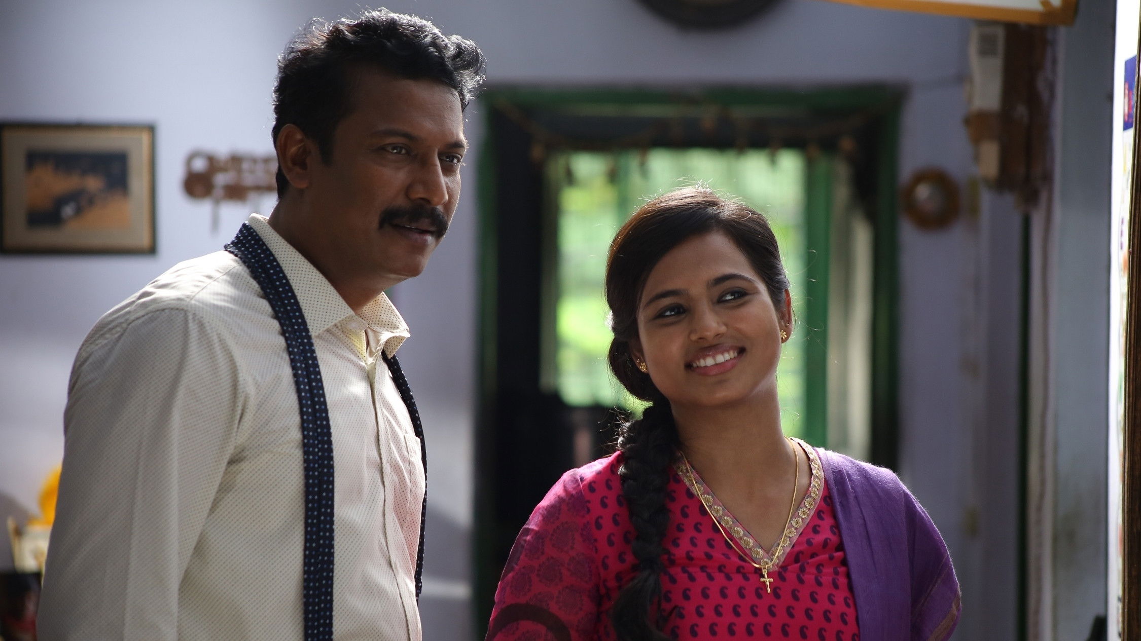 Aan Devathai Background