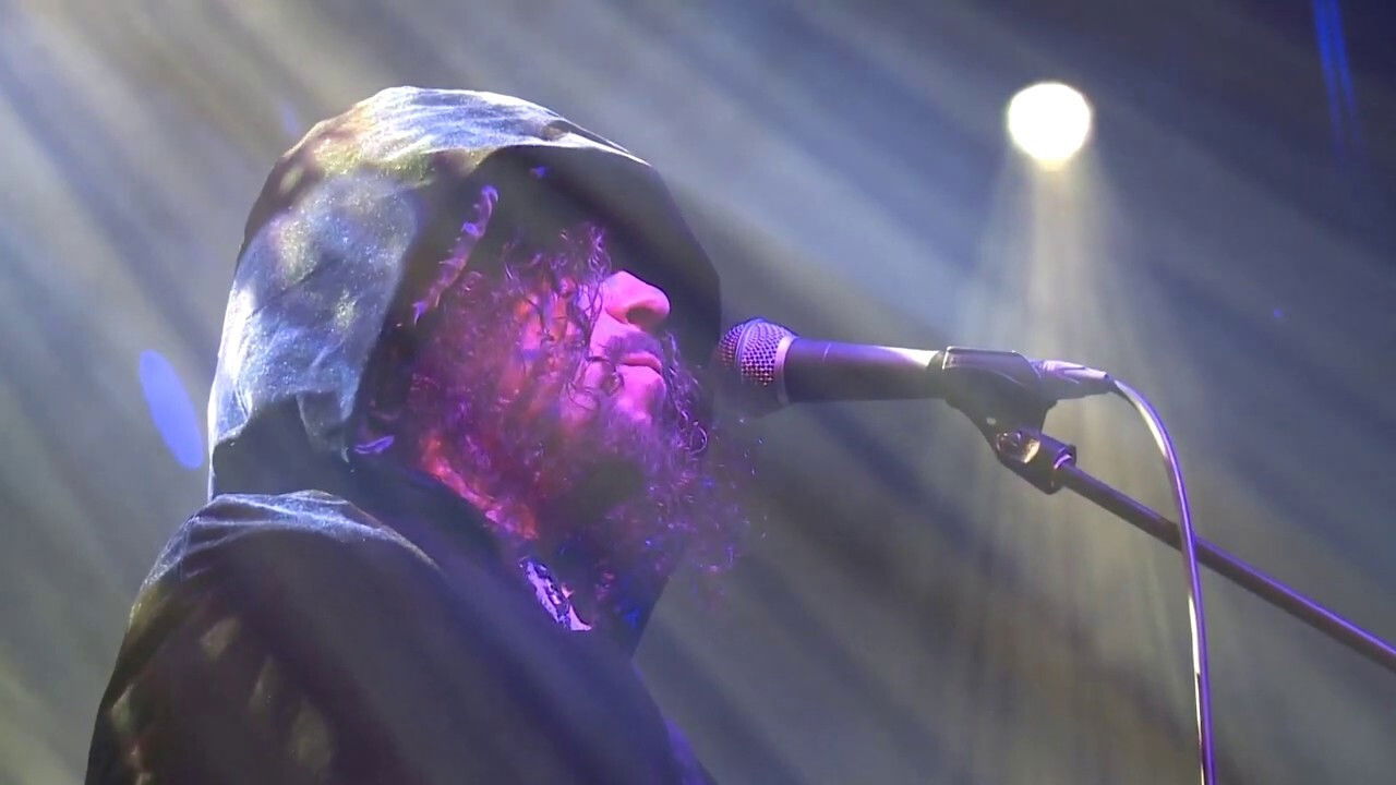 Arena Re-Visited Live! Background