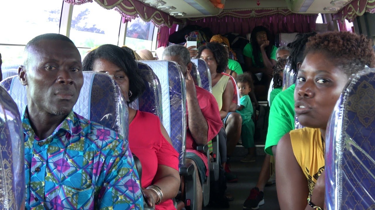 Life and Debt Background